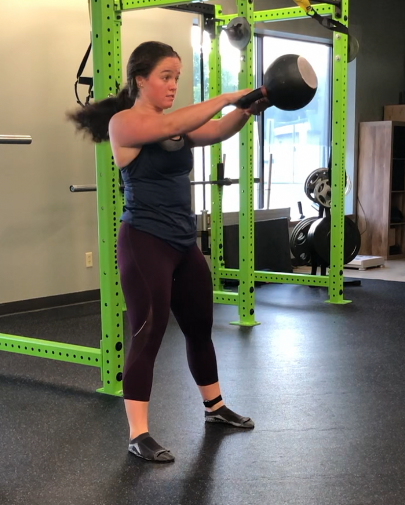 Me, performing a kettlebell swing